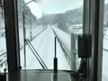 敦賀発臨時普通列車雪の近江塩津に到着
